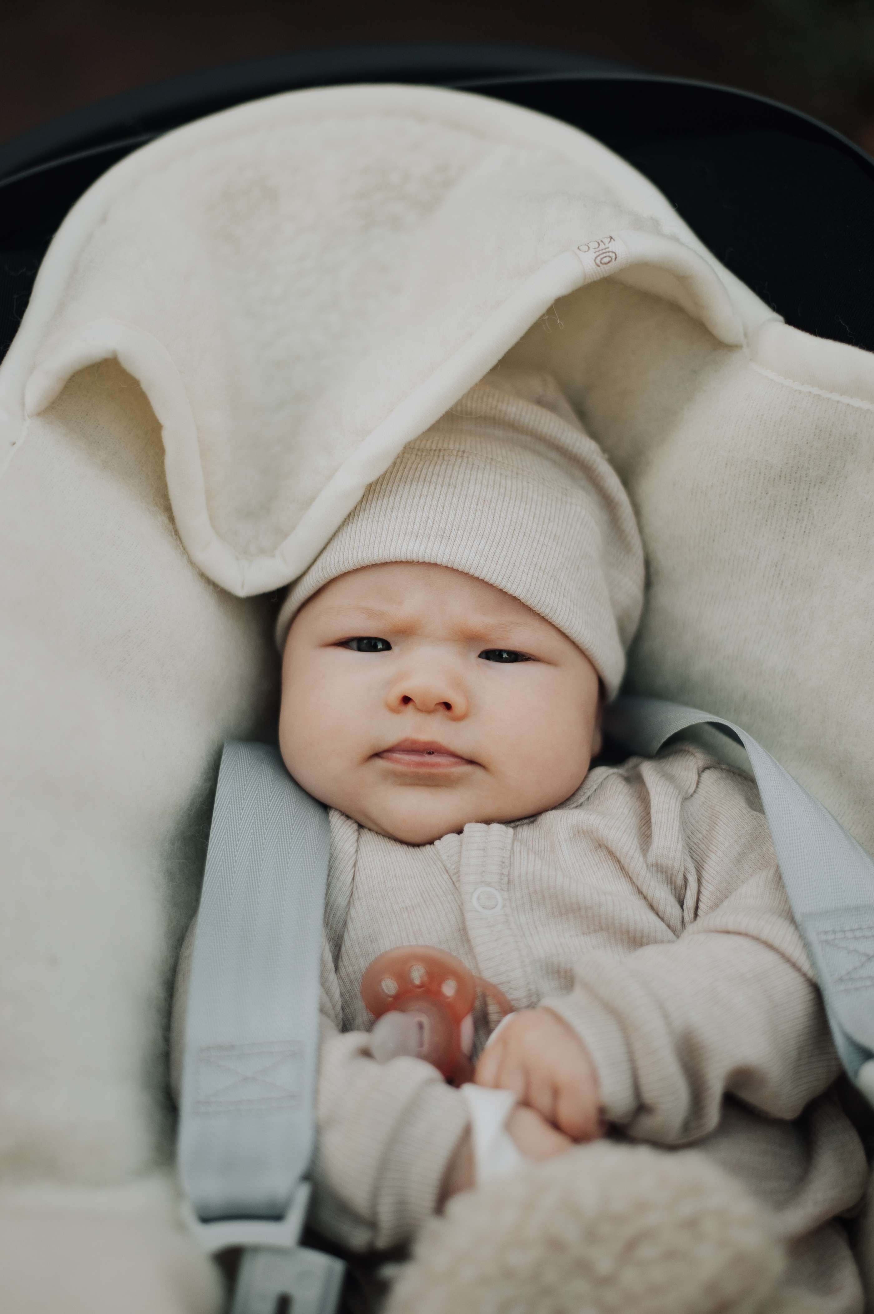 Wikkeldeken met maxi-cosi openingen