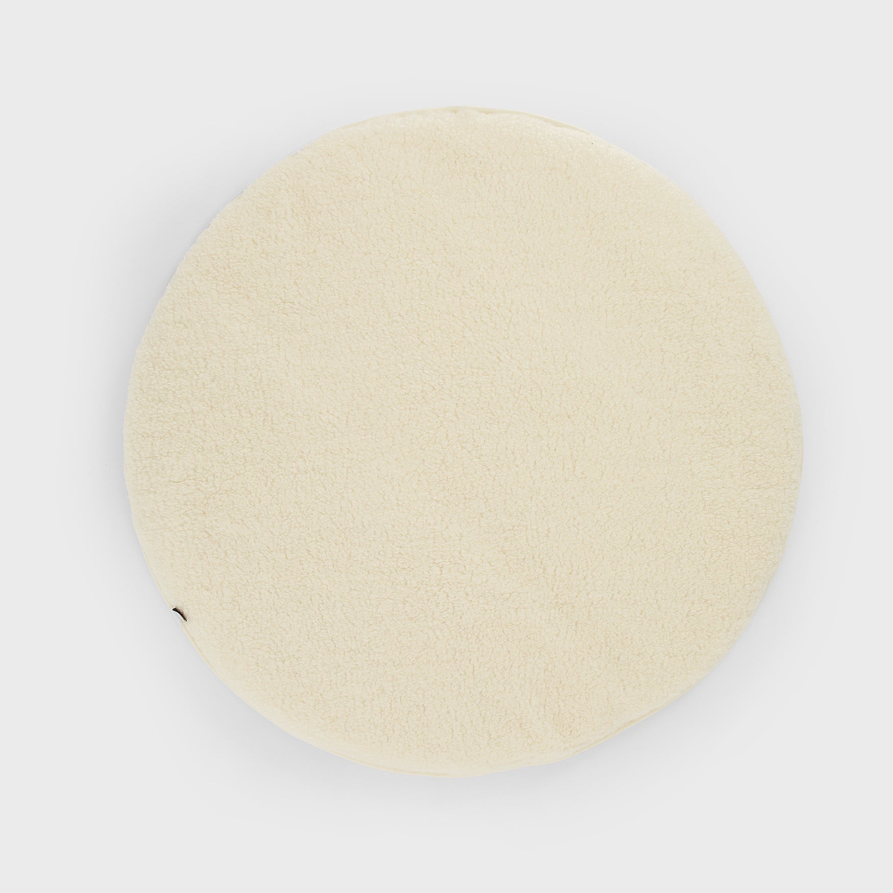 Round playpen rug made of merino wool